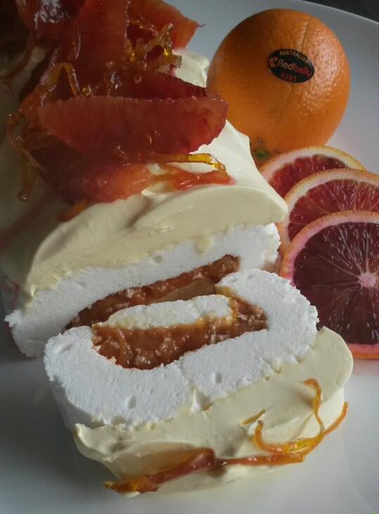 Blood orange pavlova roll