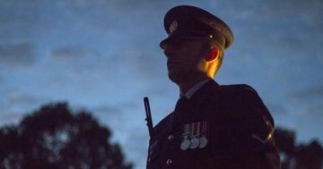 Dawn Service attendees encouraged to rug up and use public transport for Anzac Day commemorations
