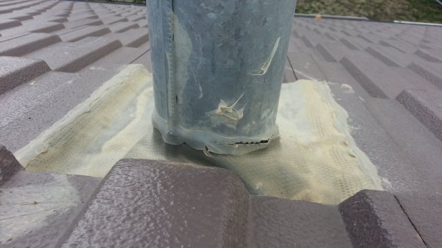 Leaky roof - flues not sealed correctly?