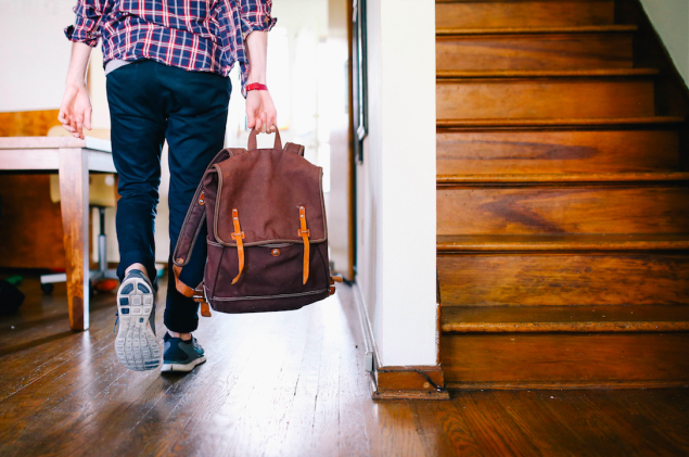 stock-man-office-work-backpack