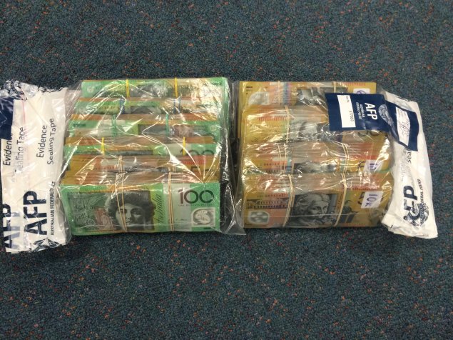 Man on trafficking charge after drugs, cash seized in Belconnen, Gungahlin