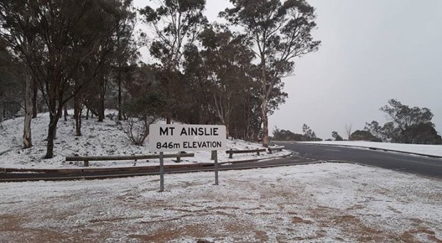 Canberra wakes up to snow; storm damage