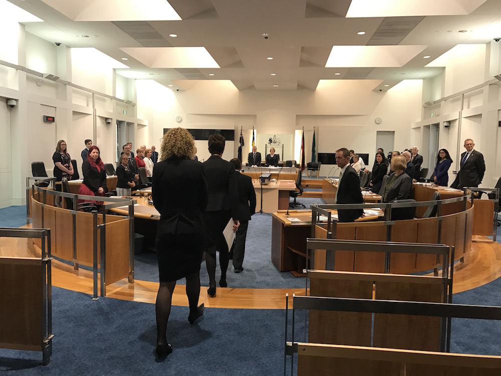 MLAs-elect watch as ACT Chief Justice Helen Murrell arrives in the Legislative Assembly Chamber for their swearing in. Photo: Charlotte Harper