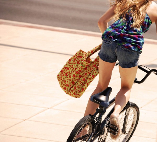 woman-cycling-600x543
