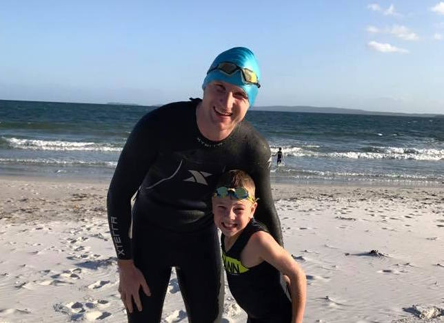 Last year Brendan Irvine and son Harry competed in their first triathlon to mark a year to the day of their kidney transplant (Brendan donated a kidney to Harry). They're pictured here after their second triathlon, in December. Photo: Susie Irvine