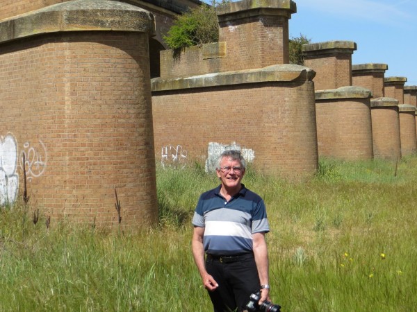 Caption: Chair of the ACT Heritage Council, David Flannery, at Goulburn’s early rail infrastructure that coincided with a golden era, similar to the potential growth on offer from light rail in Canberra. Photo: John Thistleton.