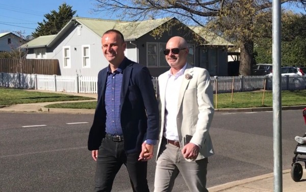 AndrewBarr and partner Anthony Toms arriving to vote in the ACT election last October. Photo: Charlotte Harper