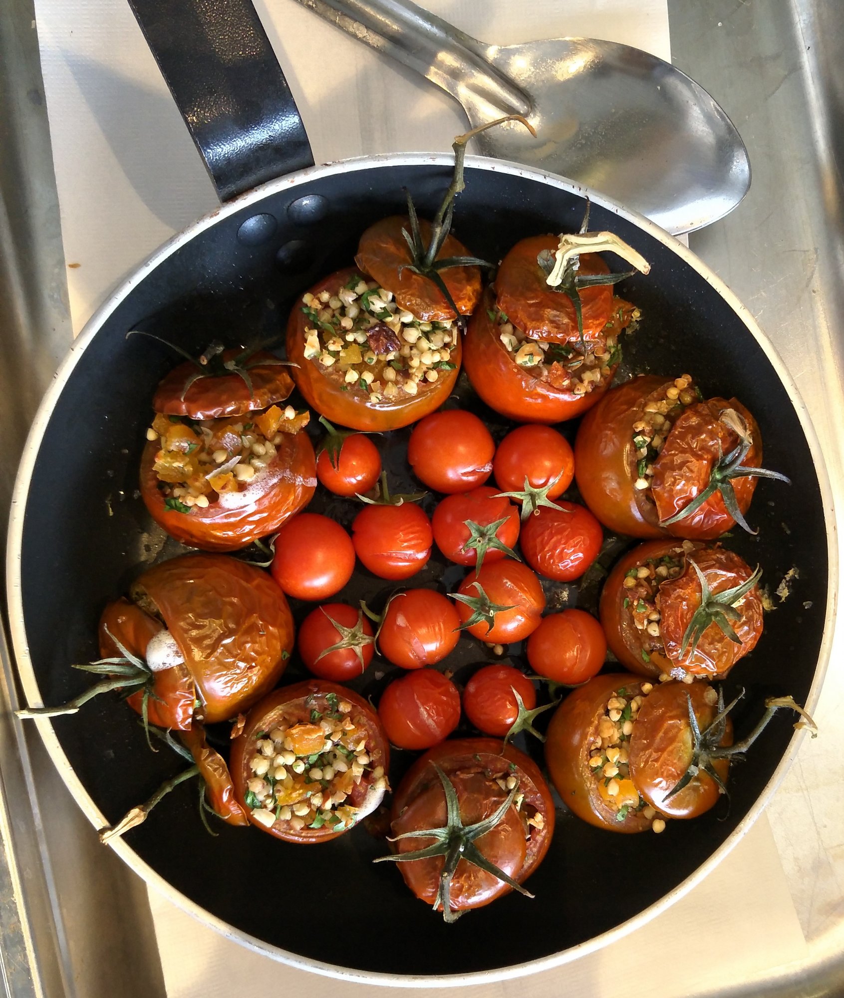 cropped tomatoes filled with buckwheat