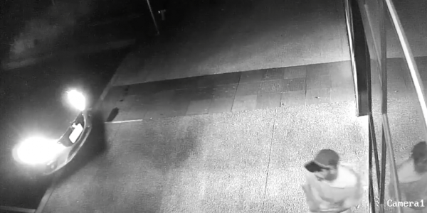 Man caught on CCTV breaking in Majura bike store. Photo: CCTV still