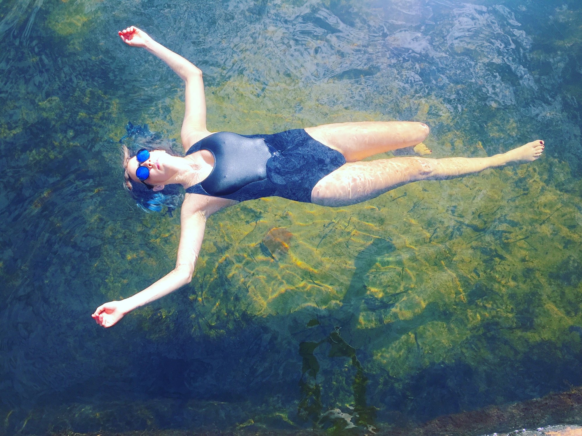 Woman floating in Karloo pools