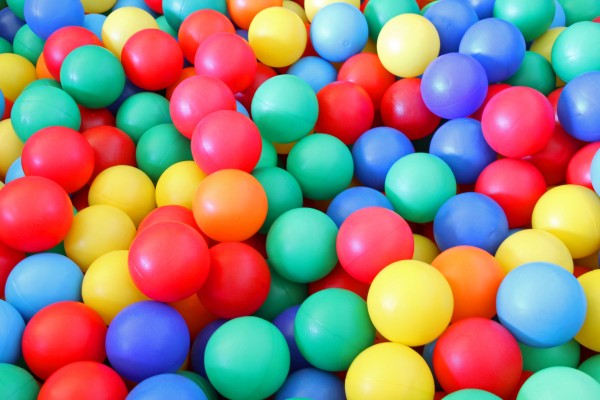 bright colored plastic ball in a swimming pool of a nursery to play