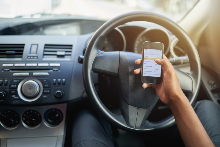 driver looking at phone