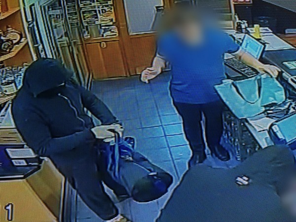 A still from CCTV of the robbery last night. 