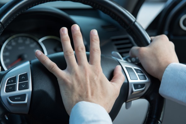 Photo of driver honking in traffic