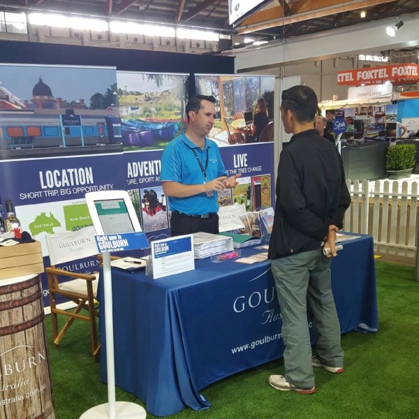 Caption: James Groves from Goulburn Mulwaree Council (left) offers advice to a visitor at the Sydney Royal Easter Show. Photo: supplied.