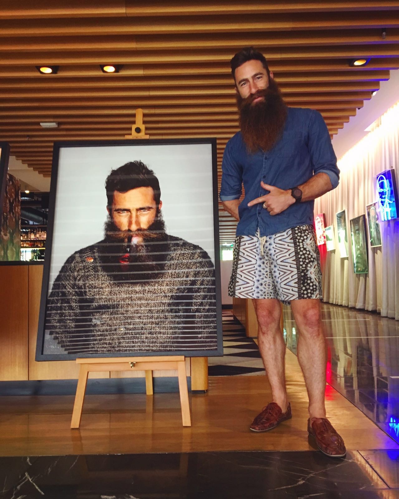 Photographic exhibition of beards at QT Canberra