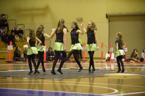 Dancers from young primary school age to adult from the Liz Gregory Irish Dance perform at half-time during the Canberra Roller Derby game