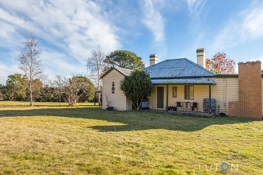 Period cottage with 50 acres and river frontage for sale at $665,000