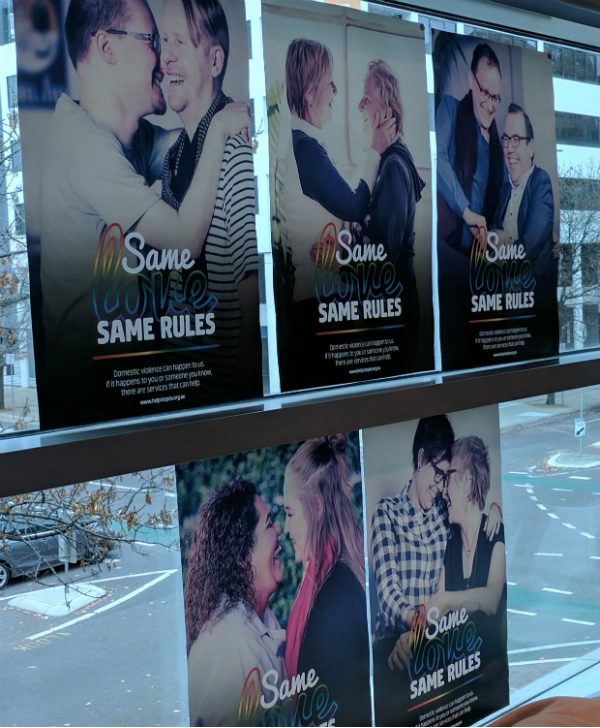 Same love, same rules posters on the window of the ACT Human Rights Commission