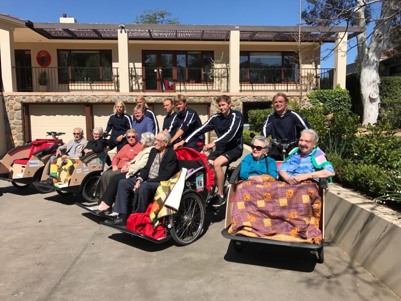 Senior citizens in Canberra enjoy a cargo bike ride by Danish students for Cycling Without Age