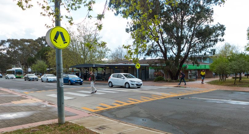 man crossing at a pedestrian crossing