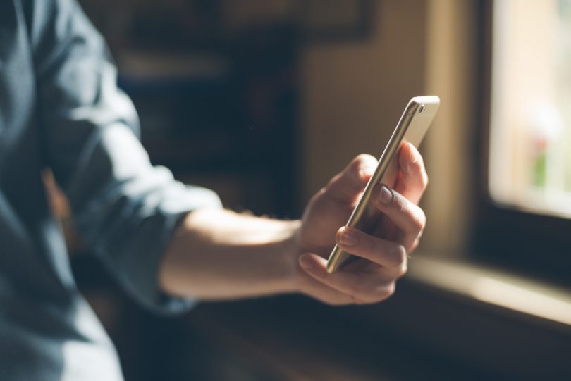 Boy holding a smartphone