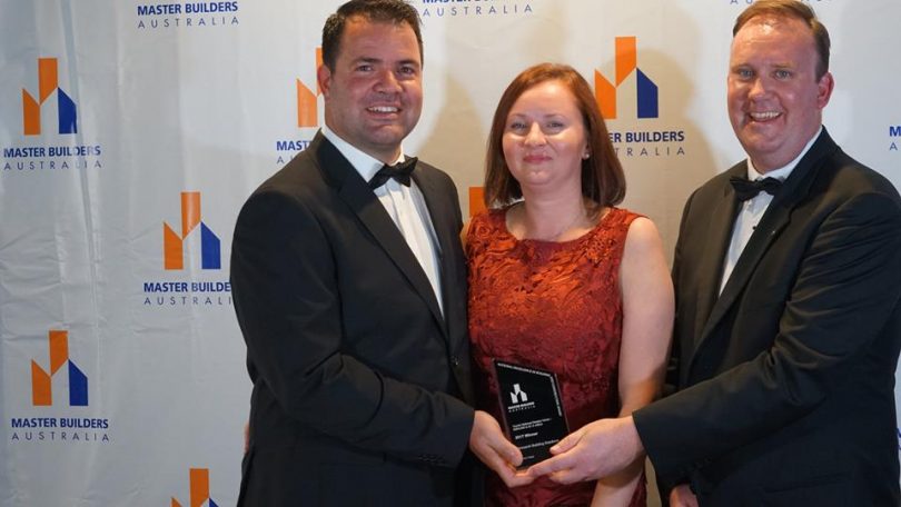 Monarch's Valeiro and Kasia Galeotti, with Master Builders ACT CEO Michael Hopkins at the awards.