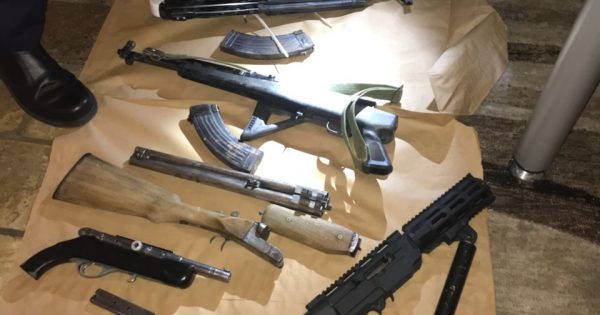Police seize guns, ammunition and a hand grenade in bikie raids