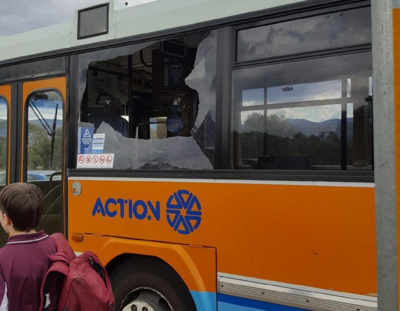 bus and shattered window