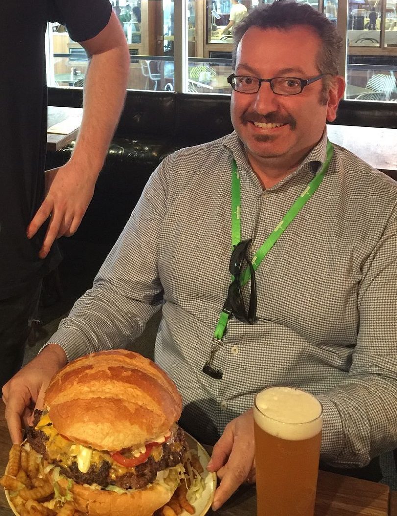 Elias with burger. Photo: Jasmine Hallaj.