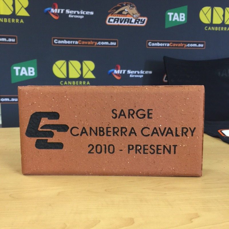 The first brick, signed by Cavalry's Sarge himself. Photo: Eileen Jamolo. 