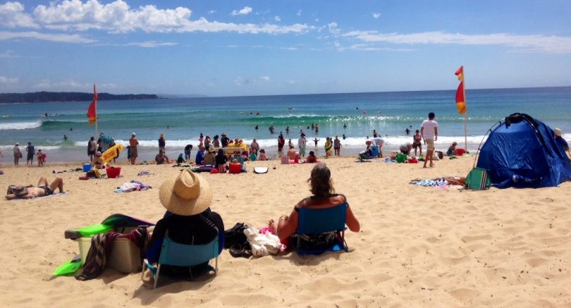 Tathra Beach at its best in February, the only beach south of Mollymook with the flags flying seven days a week. Photo: Sapphire Coast Tourism