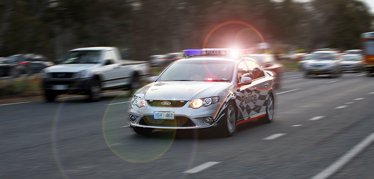 Police car in traffic.