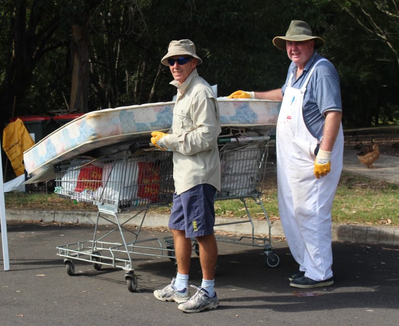 Ron Price and Rob Devanald working hard at the Batemans Bay Water Gardens. Photo: Eurobodalla Shire Council.