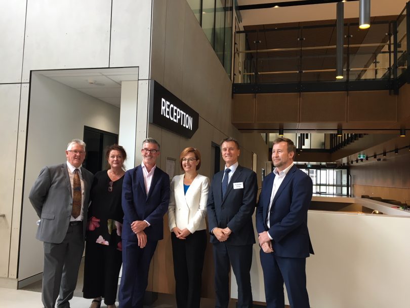 Health Minister Meegan Fitzharris (white coat) with representatives from ACT Health, University of Canberra and Multiplex.