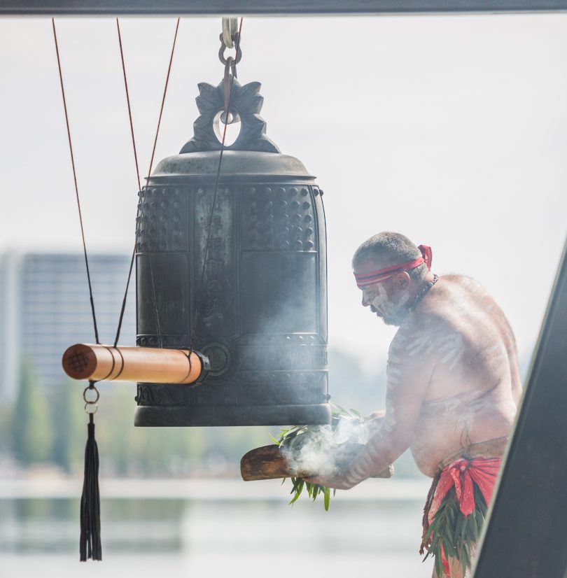 A traditional smoking ceremony at the unveiling of the Canberra Rotary Peace Bell at Canberra Nara Peace Park in Yarralumla. Photos: Jack Mohr.