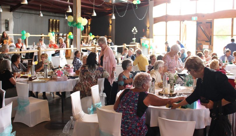 Around 150 people gathered for a lunchtime auction at Oaklands in Pambula, raising money for Can Assist. Photo: Ian Campbell.