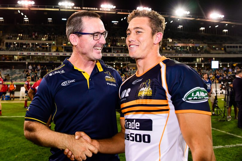 Super Rugby, week eight; Brumbies v Reds at GIO Stadium, Canberra. Brumbies head coach Dan McKellar congratulates debutant James Verity-Amm at full time. Photo: RUGBY.com.au/Stuart Walmsley