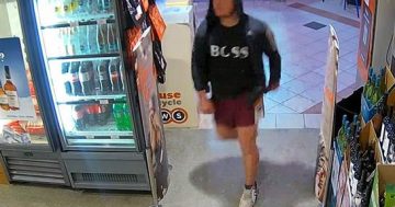 CCTV captures alleged Erindale bottle shop robber