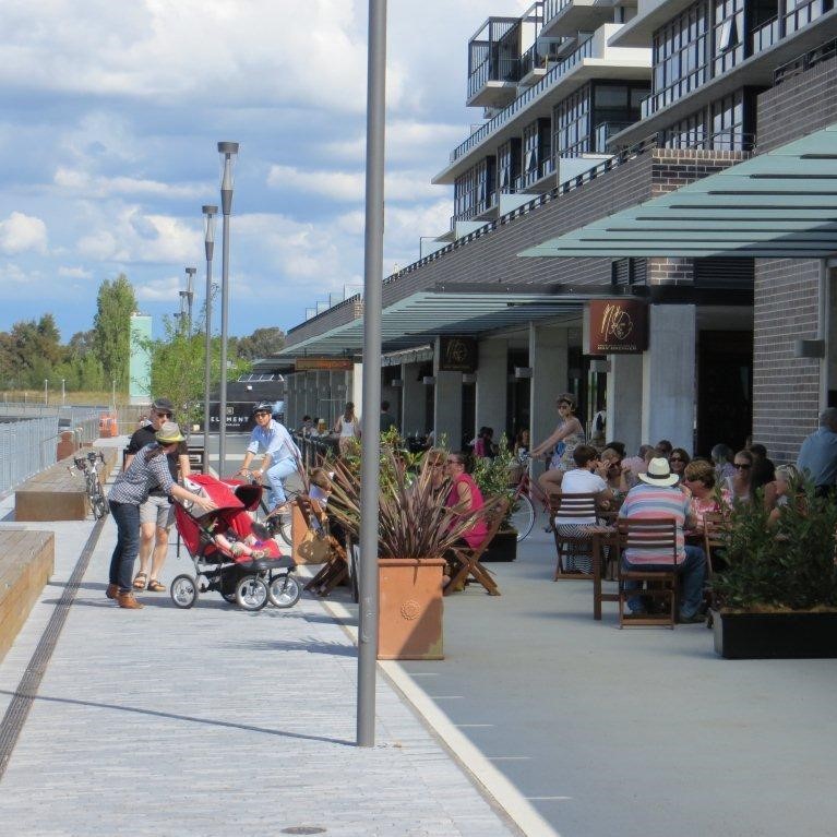 people walking and riding on paths 