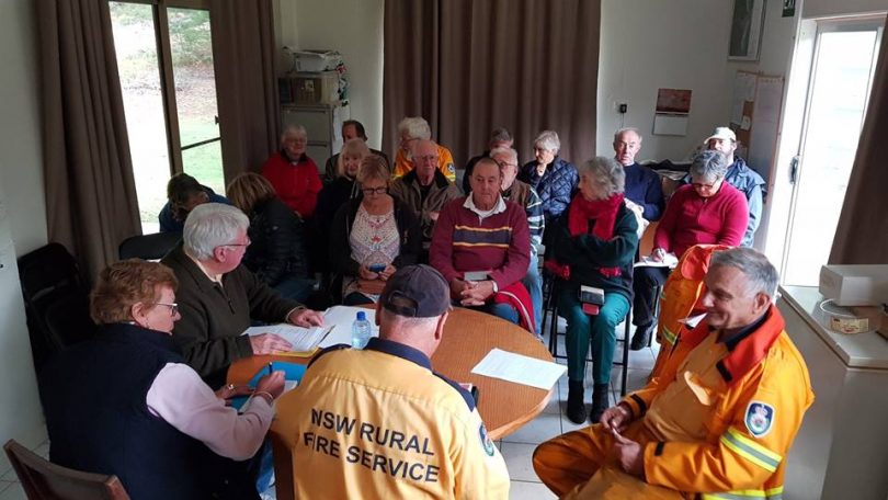 With no threat of fire, Potato Point RFS held their AGM on Saturday, mind you strong winds brought powerlines down and there was a blackout. Geoff Radcliffe is Captain . Photo: Potato Point Fire Brigade Facebook.