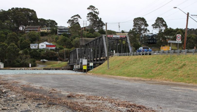 You can't Mr Russell's three billboards as you head north over the Narooma Bridge. Photo: Ian Campbell.