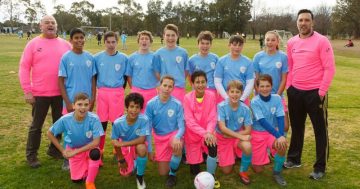 Canberra football fields dazzled with pink as Belsouth Football Club shoot for a cure