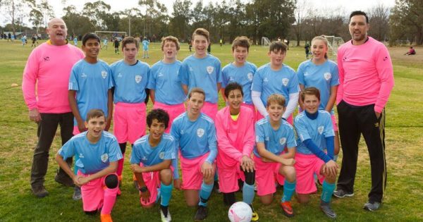 Canberra football fields dazzled with pink as Belsouth Football Club shoot for a cure