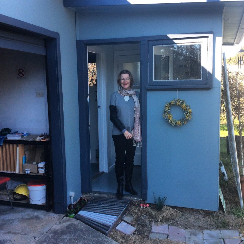 Anne in her backyard, before tranforming it into a gallery. 