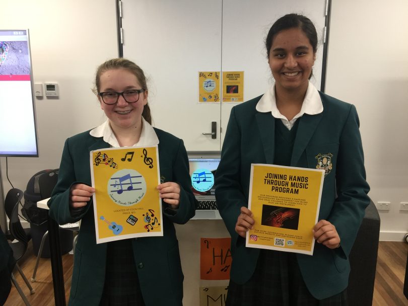 Canberra Girls Grammar School year 9 students and Directors of Joining Hands Through Music, Alexandria Benson and Meher Sandhu (Photo supplied).