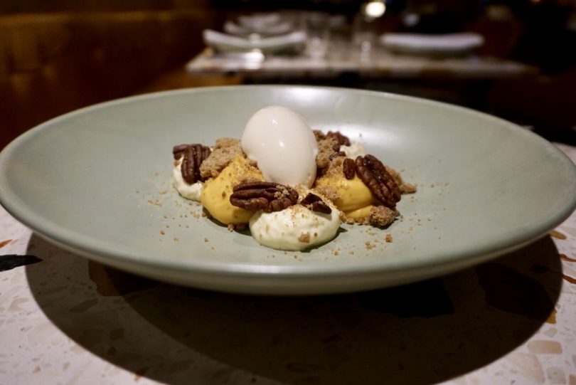 Roasted pumpkin puree, cardamom, smoked maple ice cream, candied pecan, chai. Photo by Sophia Brady