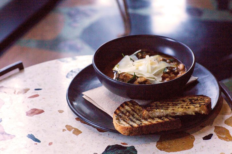 Ribbolita with slow cooked egg with Reggiano and charred sourdough. Image supplied