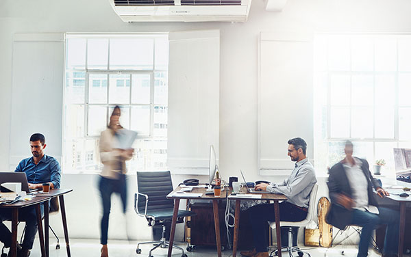 Workers in a typical office setting.