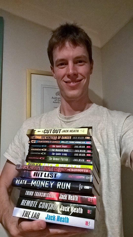 Jack Heath with his novels - ready to go. Image supplied.